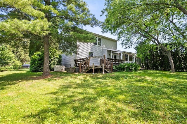 53 Alecia Dr, Greece, NY 14626 - rear view of property with a deck, a yard, and stairs