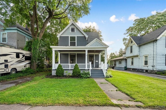 117 Prospect St, Lenox, NY 13032 - victorian house featuring covered porch and a front yard