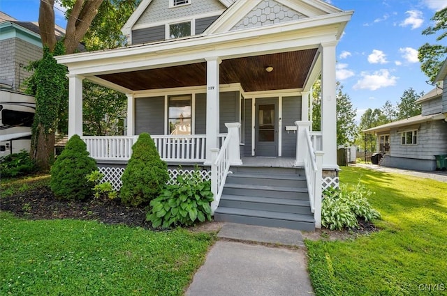 117 Prospect St, Lenox, NY 13032 - view of front facade with covered porch and a front lawn