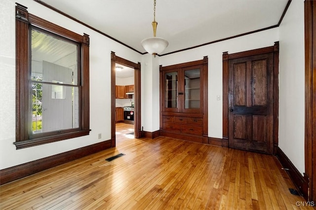 117 Prospect St, Lenox, NY 13032 - spare room with light wood-style flooring and ornamental molding