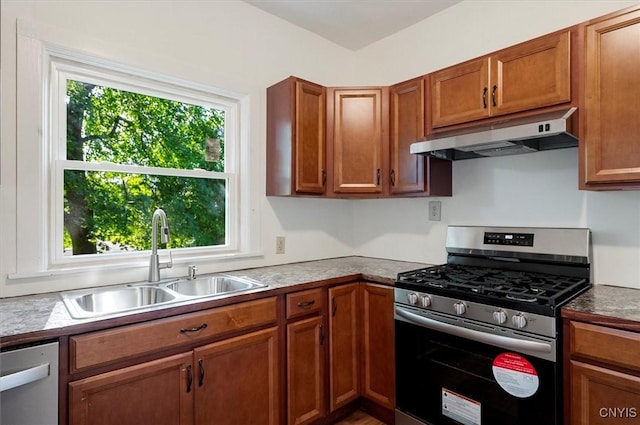 117 Prospect St, Lenox, NY 13032 - kitchen featuring appliances with stainless steel finishes, under cabinet range hood, and brown cabinets