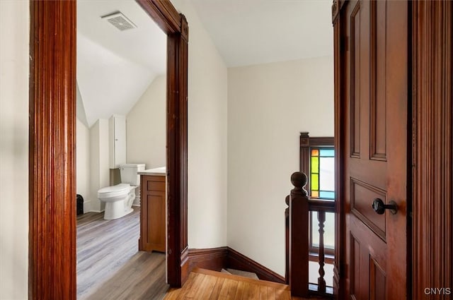 117 Prospect St, Lenox, NY 13032 - hallway with light wood-type flooring, lofted ceiling, and an upstairs landing