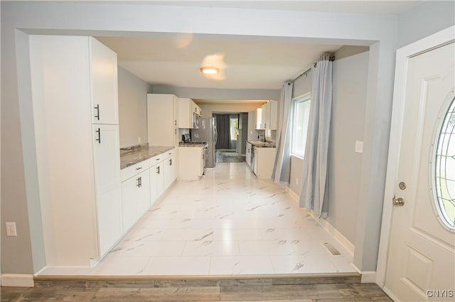 118 Hanover Ave, Salina, NY 13088 - kitchen featuring white cabinets and light marble finish floors