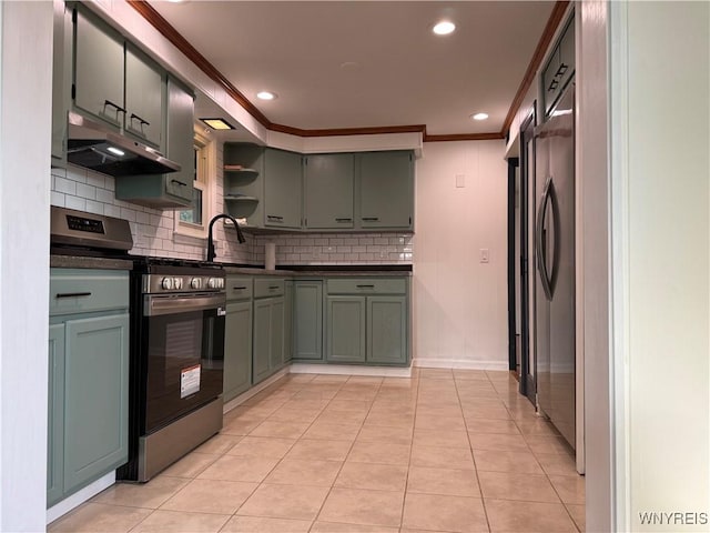 112 Conant Dr, Buffalo, NY 14223 - kitchen with stainless steel range oven, under cabinet range hood, dark countertops, backsplash, and recessed lighting