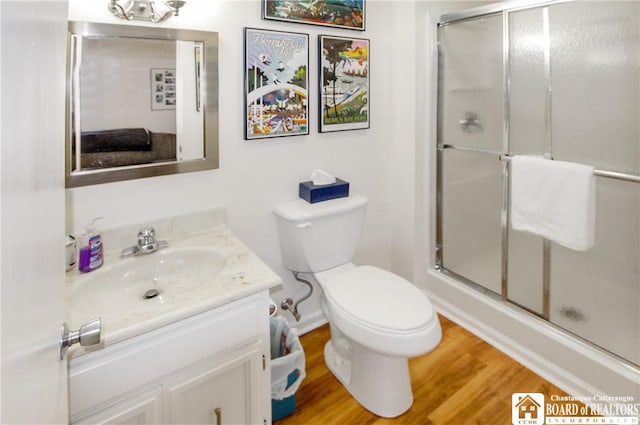 C4 Oneida Dr, Chautauqua, NY 14728 - bathroom featuring vanity, an enclosed shower, and wood finished floors