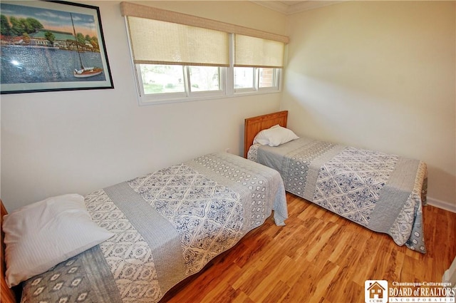 C4 Oneida Dr, Chautauqua, NY 14728 - bedroom with wood finished floors and crown molding