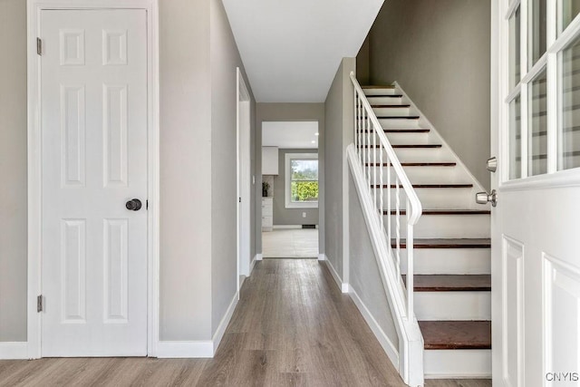 7921 Davis Rd N, Clay, NY 13041 - stairs featuring wood finished floors