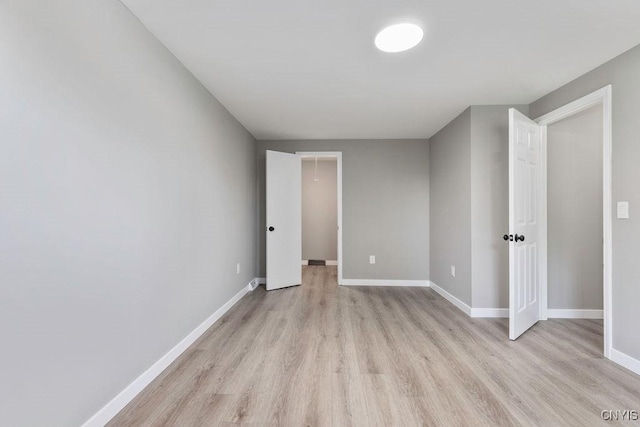 7921 Davis Rd N, Clay, NY 13041 - unfurnished bedroom featuring light wood-style floors