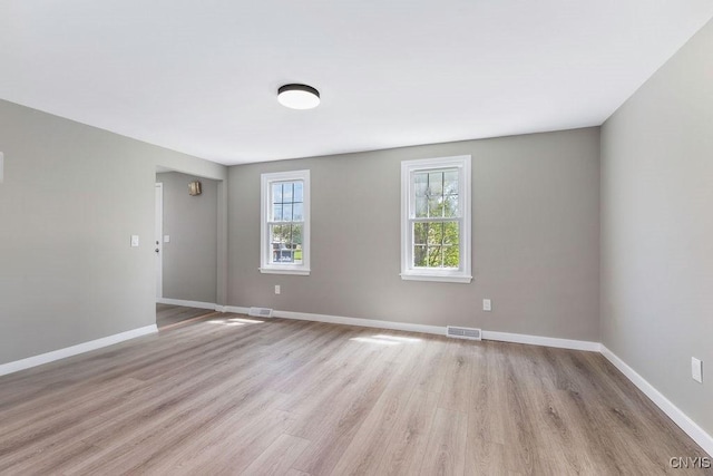 7921 Davis Rd N, Clay, NY 13041 - unfurnished room with light wood-style floors and baseboards