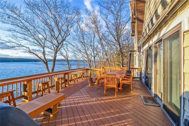 4555 Davies Rd, Hector, NY 14818 - deck featuring a water view and outdoor dining space