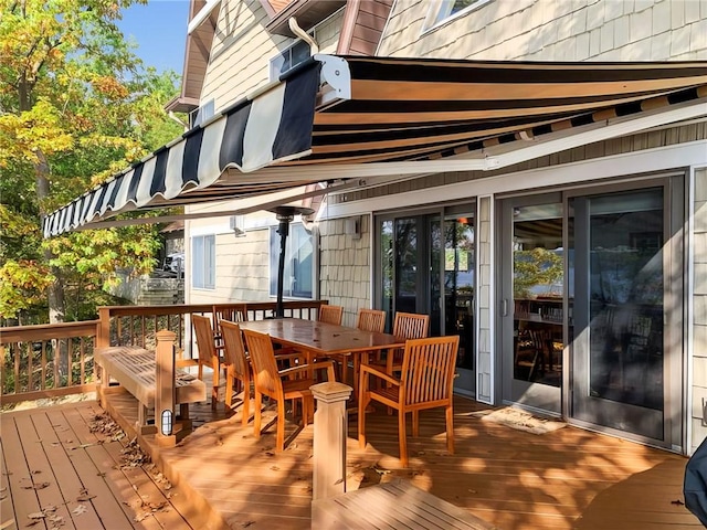4555 Davies Rd, Hector, NY 14818 - wooden deck with outdoor dining area