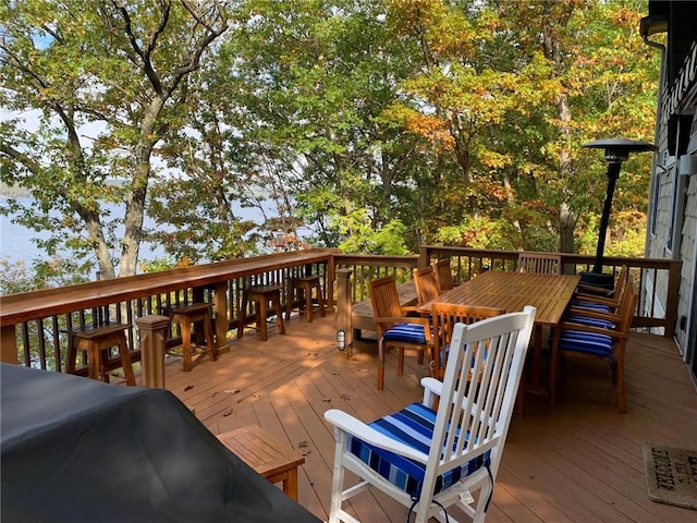 4555 Davies Rd, Hector, NY 14818 - deck featuring outdoor dining area