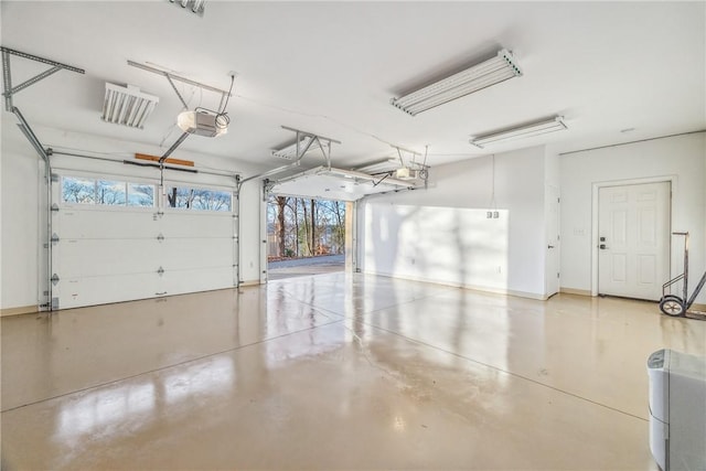 4555 Davies Rd, Hector, NY 14818 - garage featuring a garage door opener