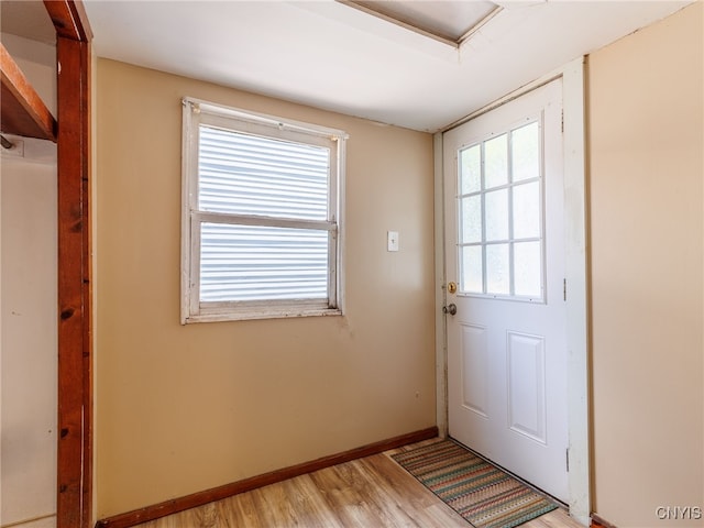 308 Howk St, Watertown City, NY 13601 - doorway featuring light wood-type flooring and baseboards