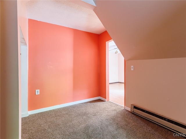 308 Howk St, Watertown City, NY 13601 - bonus room featuring a baseboard heating unit and carpet