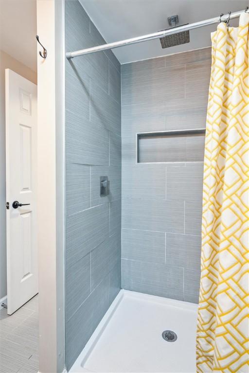 3389 Orchid Cres, Walworth, NY 14568 - bathroom with tiled shower