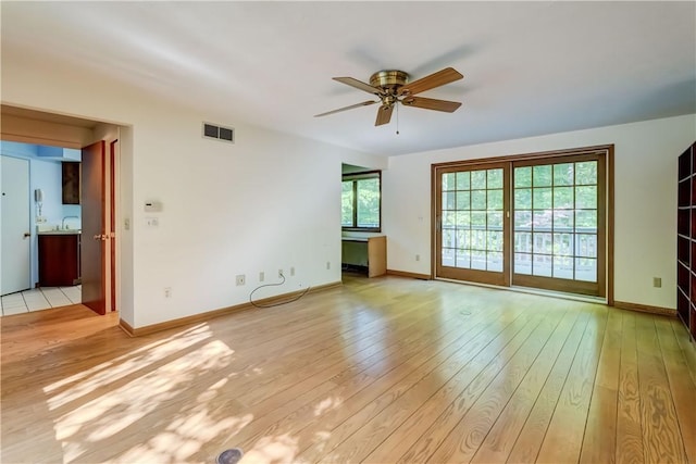 120 Scotch Ln, Irondequoit, NY 14617 - empty room featuring ceiling fan and light wood-style floors