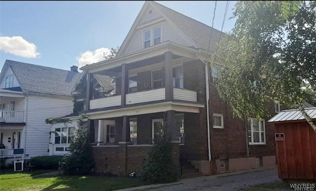 1427 Fort Ave, Niagara Falls, NY 14303 - view of front of home featuring brick siding and a front lawn
