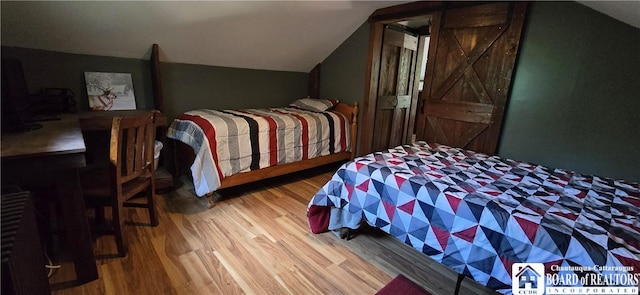 3254 Weatherby Rd, Clarksville, NY 14739 - bedroom with wood finished floors and vaulted ceiling