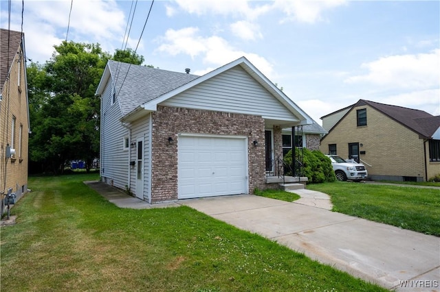 261 Ehinger Dr, West Seneca, NY 14224 - view of front of home featuring concrete driveway, brick siding, a garage, and a front lawn