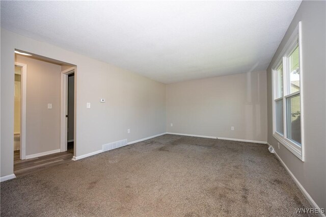 261 Ehinger Dr, West Seneca, NY 14224 - carpeted empty room with baseboards