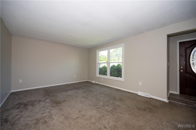 261 Ehinger Dr, West Seneca, NY 14224 - entrance foyer featuring dark colored carpet