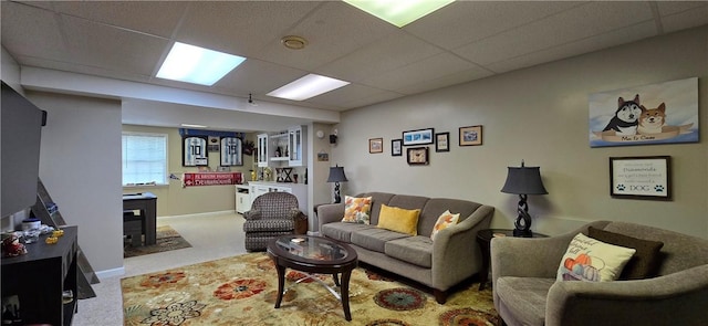 3390 Conhocton Rd, Erwin, NY 14870 - carpeted living room with a paneled ceiling and a wood stove