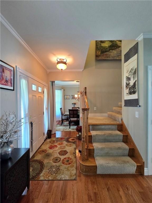 3390 Conhocton Rd, Erwin, NY 14870 - foyer entrance featuring wood finished floors, stairway, and ornamental molding