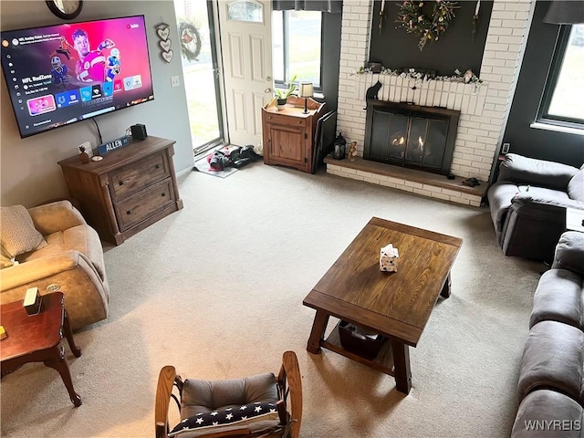 126 Ellicott Creek Rd Unit 5, Tonawanda, NY 14150 - living area with carpet flooring and a fireplace