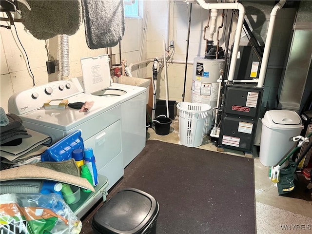 126 Ellicott Creek Rd Unit 5, Tonawanda, NY 14150 - washroom featuring washer and dryer, gas water heater, and concrete block wall