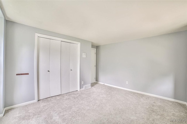 210 Townline Rd, Elma, NY 14059 - unfurnished bedroom featuring carpet flooring and a closet