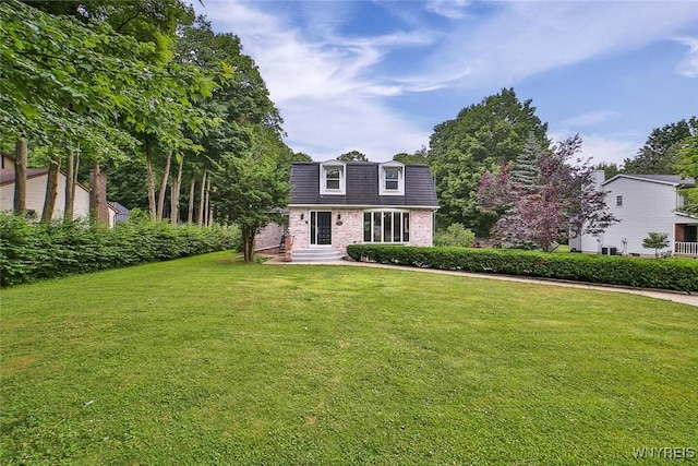 210 Townline Rd, Elma, NY 14059 - view of front of home featuring mansard roof, brick siding, a front lawn, and entry steps