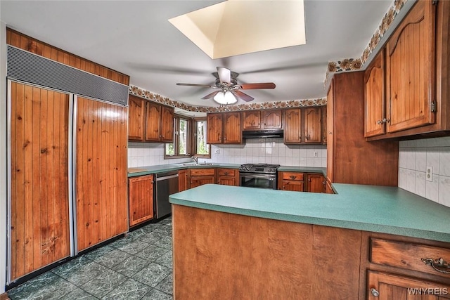210 Townline Rd, Elma, NY 14059 - kitchen featuring stainless steel appliances, decorative backsplash, under cabinet range hood, and brown cabinetry