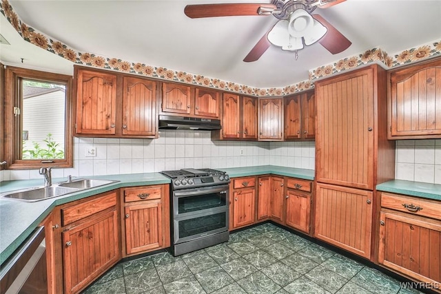 210 Townline Rd, Elma, NY 14059 - kitchen featuring appliances with stainless steel finishes, under cabinet range hood, and brown cabinetry