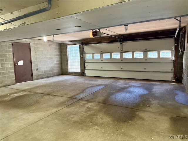 210 Townline Rd, Elma, NY 14059 - garage with a garage door opener and concrete block wall