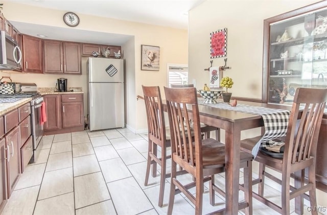 156 Barben Ave, Watertown City, NY 13601 - dining space featuring light tile patterned flooring