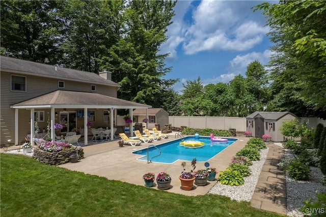 5 Family Cir, Lee, NY 13363 - view of swimming pool featuring a storage shed, a patio, a fenced backyard, and view of scattered trees