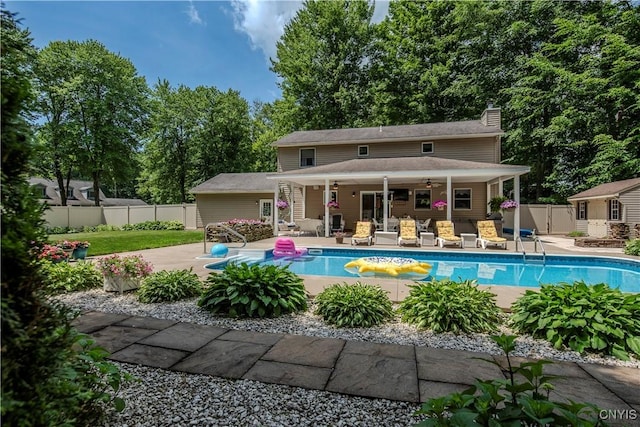 5 Family Cir, Lee, NY 13363 - view of swimming pool featuring a patio area, a ceiling fan, and view of scattered trees