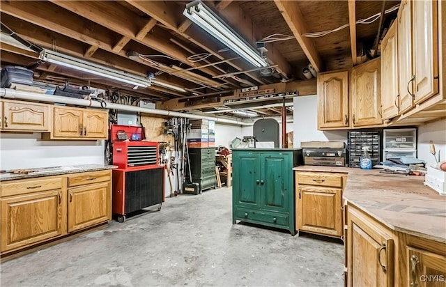 5 Family Cir, Lee, NY 13363 - unfinished basement with a workshop area