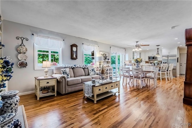 5 Family Cir, Lee, NY 13363 - living room featuring a ceiling fan, light wood-style flooring, healthy amount of natural light, and recessed lighting