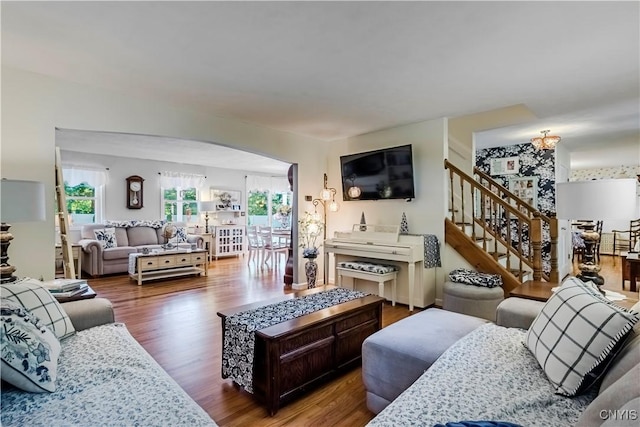 5 Family Cir, Lee, NY 13363 - living area featuring arched walkways, wood finished floors, and stairway