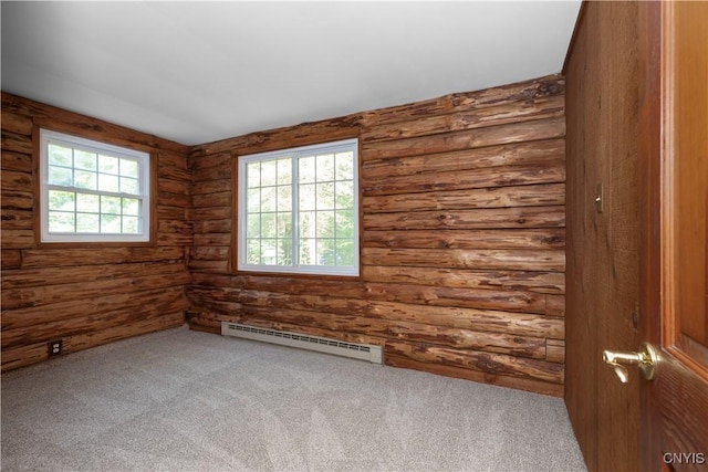 225 S Granby Rd, Granby, NY 13069 - spare room featuring a baseboard radiator, healthy amount of natural light, carpet floors, and log walls