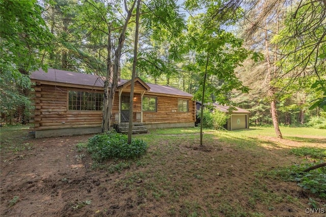 225 S Granby Rd, Granby, NY 13069 - view of front of property with log exterior and a front yard