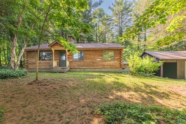 225 S Granby Rd, Granby, NY 13069 - view of front of property featuring log siding, a chimney, and a front lawn