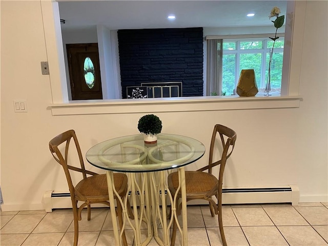 2115 Hornby Rd, Orange, NY 14812 - tiled dining space with a fireplace, recessed lighting, and a baseboard radiator