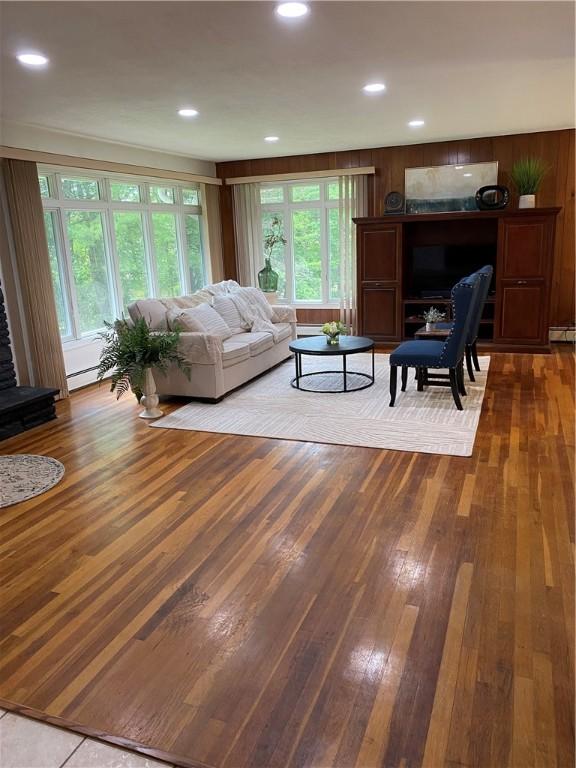 2115 Hornby Rd, Orange, NY 14812 - living area featuring wood-type flooring, healthy amount of natural light, and a fireplace