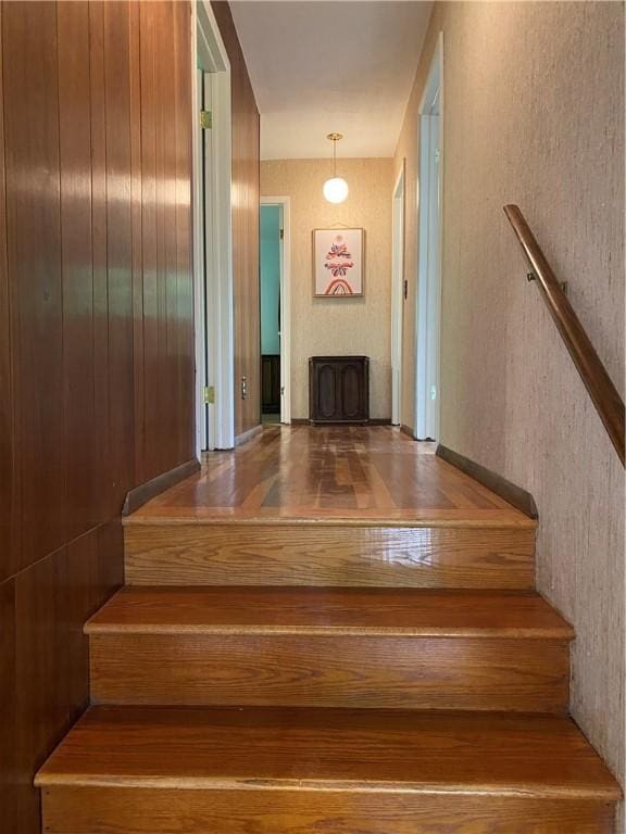 2115 Hornby Rd, Orange, NY 14812 - staircase featuring hardwood / wood-style floors and a fireplace