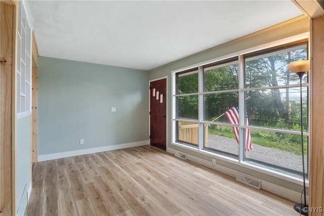 2129 Berry Rd, Lafayette, NY 13084 - empty room featuring wood finished floors and baseboards