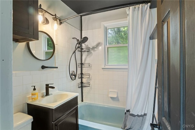 2129 Berry Rd, Lafayette, NY 13084 - full bath with shower / tub combo, vanity, and tile walls