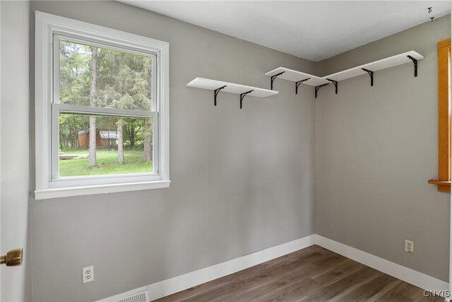 2129 Berry Rd, Lafayette, NY 13084 - walk in closet featuring dark wood finished floors